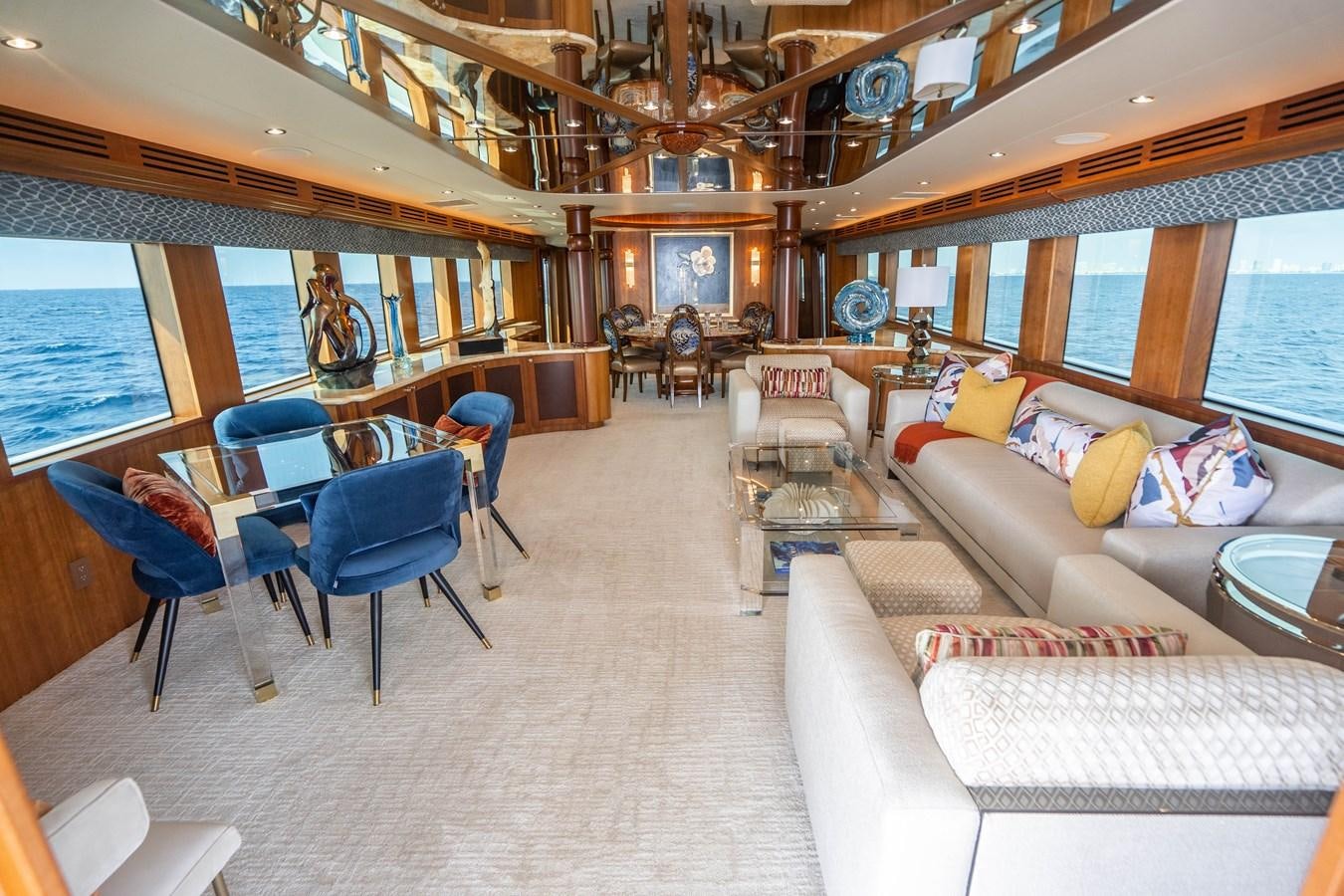 a living room with a large open floor plan aboard INEVITABLE Yacht for Sale