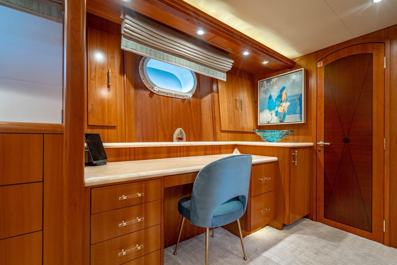 a chair in a room aboard INEVITABLE Yacht for Sale
