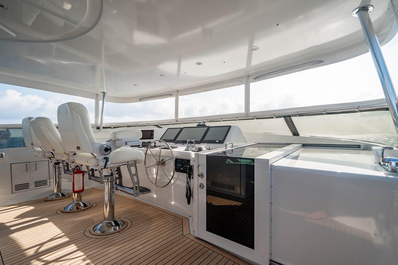 a room with a large white ceiling aboard INEVITABLE Yacht for Sale