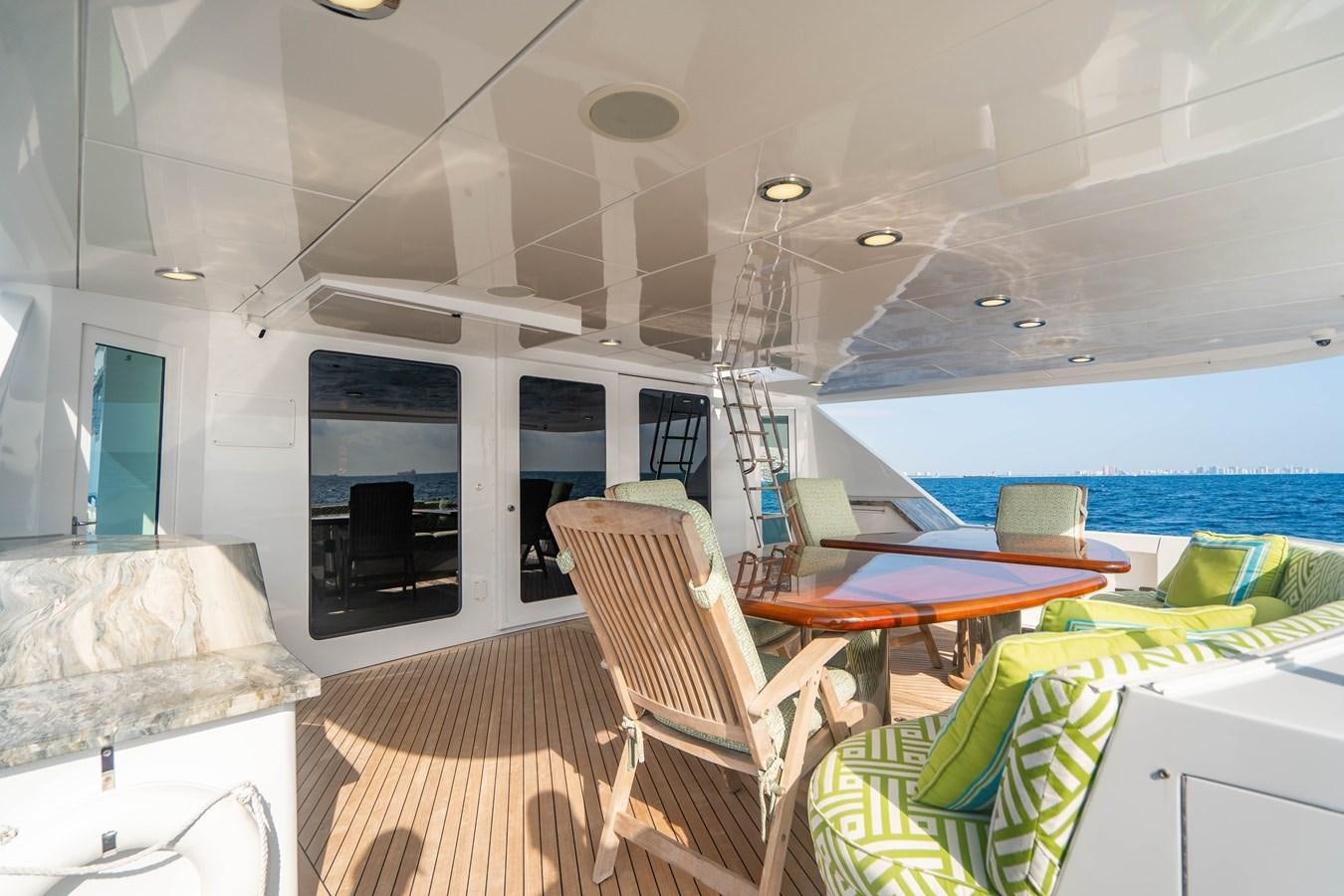a living room with a pool aboard INEVITABLE Yacht for Sale
