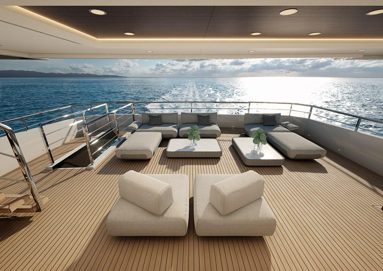 a table with chairs and a view of the ocean aboard COLUMBUS CROSSOVER 42/01 Yacht for Sale