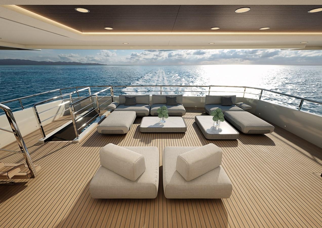 a table with chairs and a view of the ocean aboard COLUMBUS CROSSOVER 42/01 Yacht for Sale