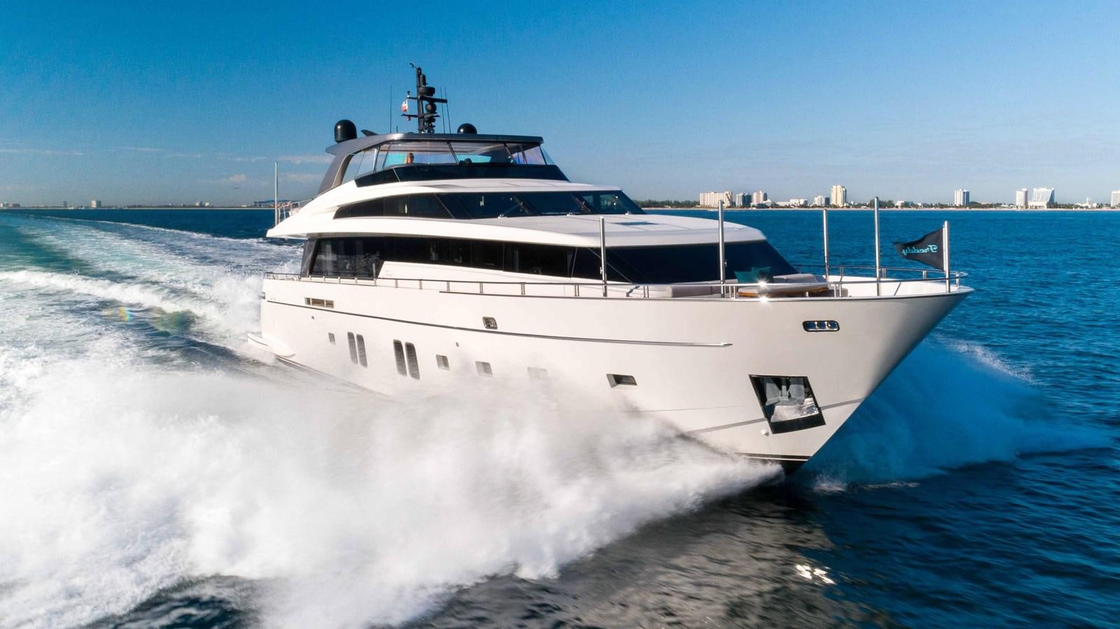 a white boat on the water aboard 106 FLYBRIDGE Yacht for Sale