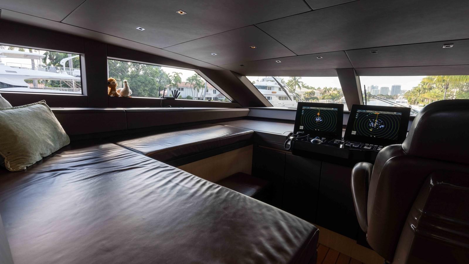 inside of a car aboard 106 FLYBRIDGE Yacht for Sale