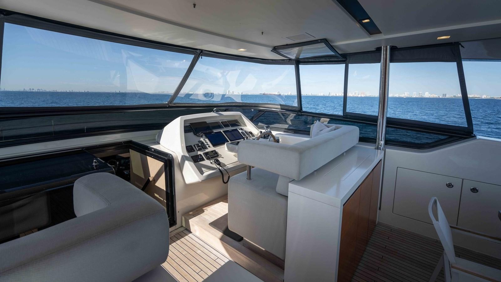 inside of a car aboard 106 FLYBRIDGE Yacht for Sale