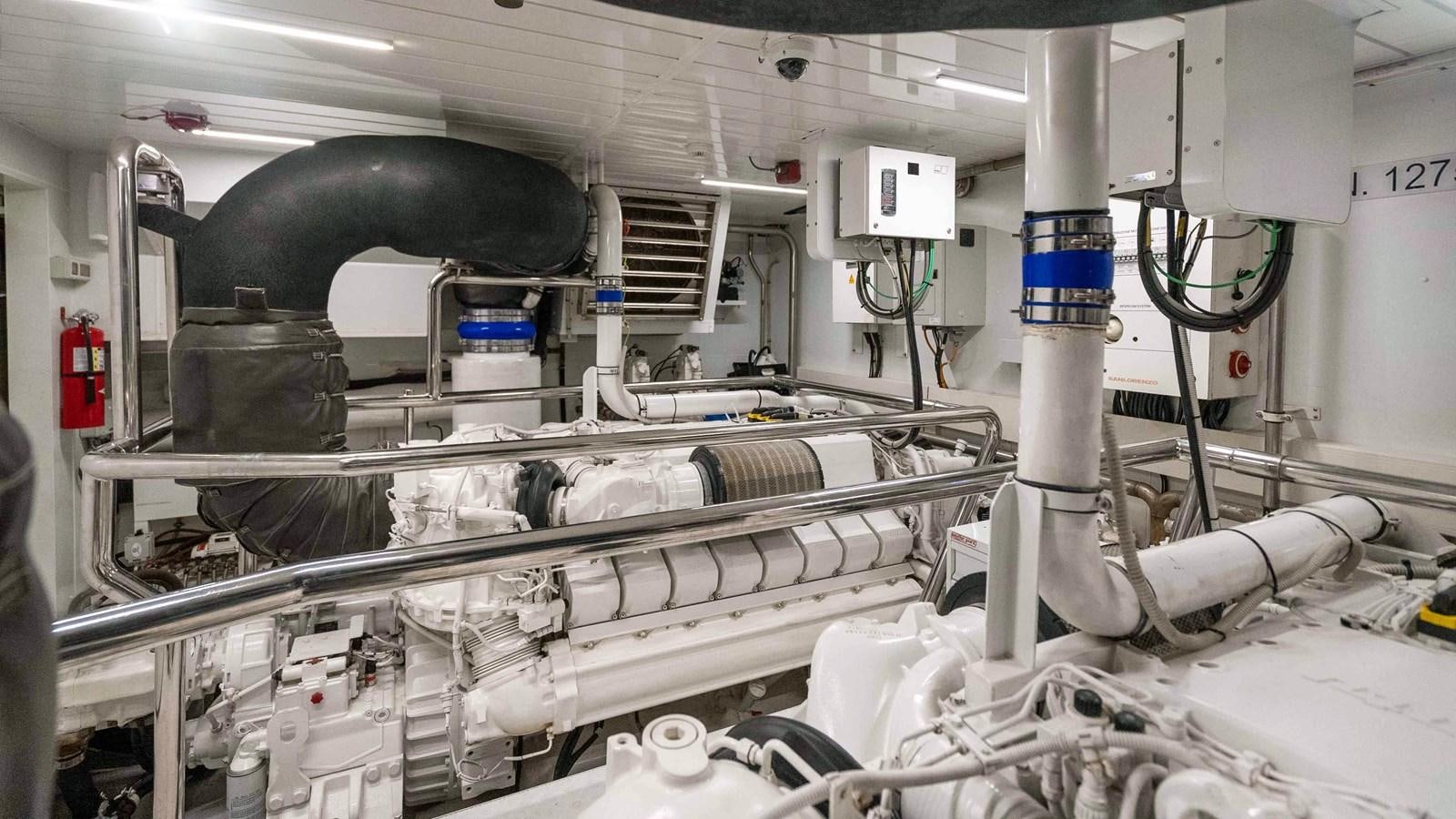 a machine with a large pipe aboard 106 FLYBRIDGE Yacht for Sale