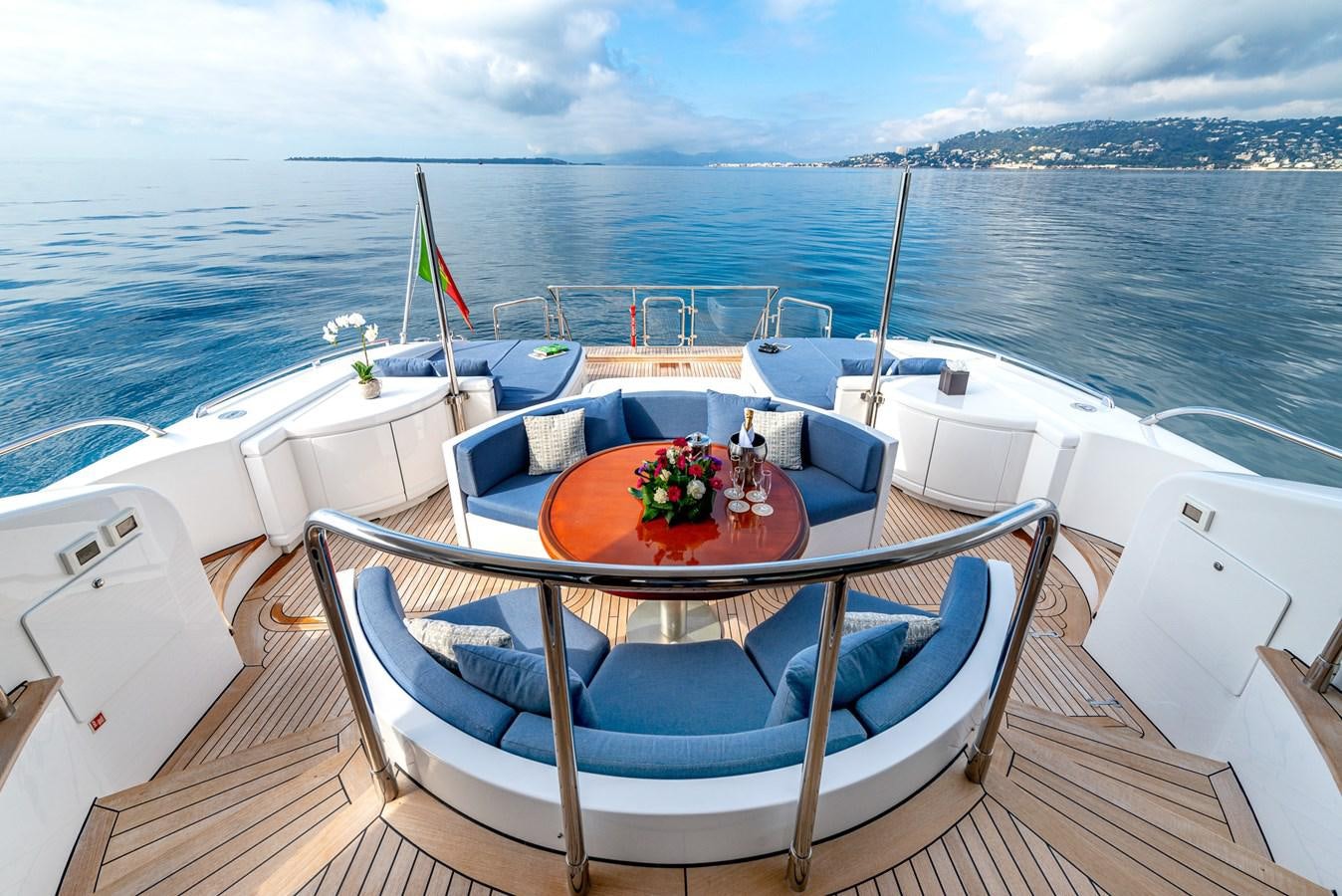 a boat with a table on it aboard STORM Yacht for Sale