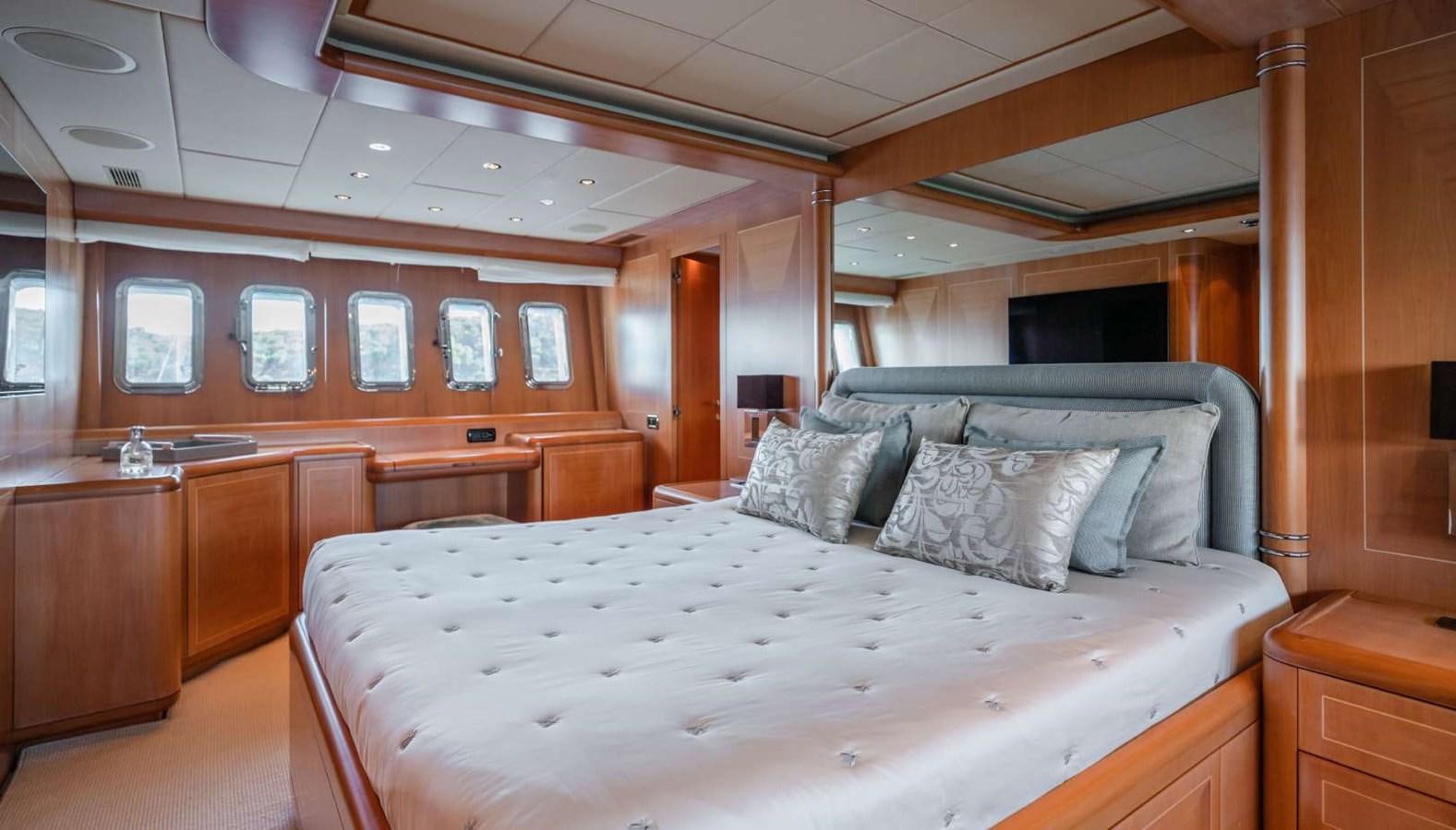 a bed in a cabin aboard STORM Yacht for Sale