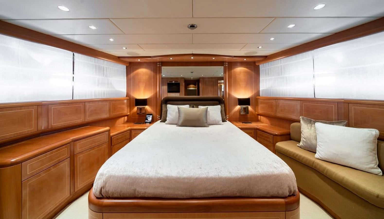 a bed in a room aboard STORM Yacht for Sale
