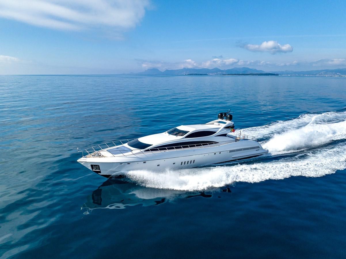 a white yacht on the water aboard STORM Yacht for Sale