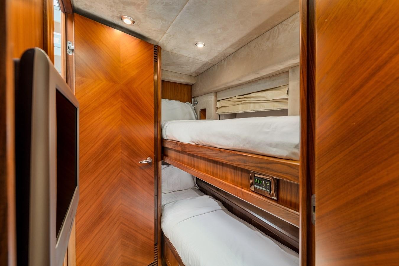a room with bunk beds aboard MILA DUBAI Yacht for Sale