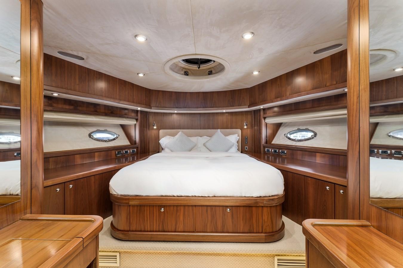 a bed in a room aboard MILA DUBAI Yacht for Sale