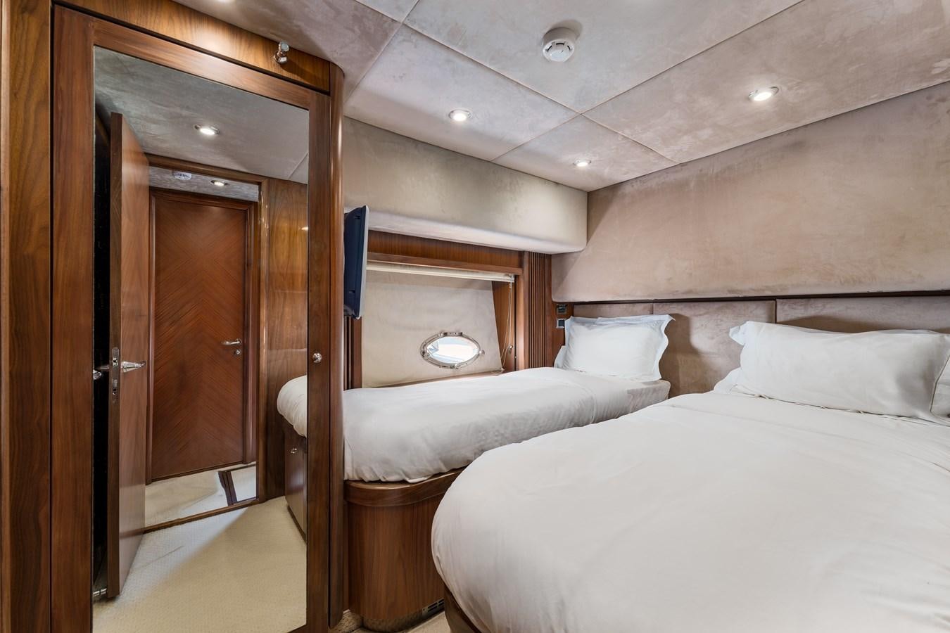 a room with two beds aboard MILA DUBAI Yacht for Sale