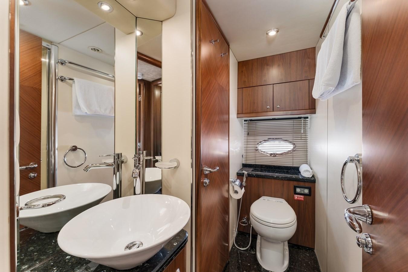 a bathroom with a sink and toilet aboard MILA DUBAI Yacht for Sale