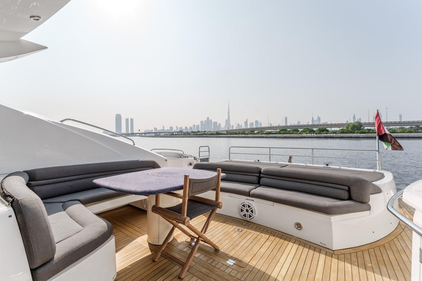 a boat on a deck aboard MILA DUBAI Yacht for Sale