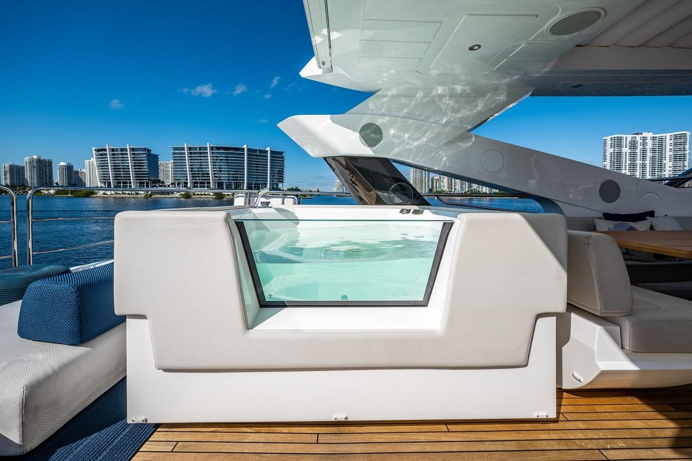 a large white yacht in a large body of water aboard MANDALA Yacht for Sale