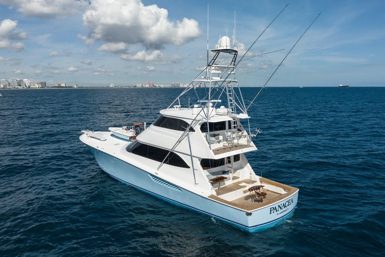 a white boat in the water aboard PANACEA Yacht for Sale