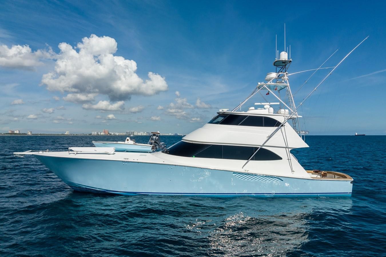 a white yacht on the water aboard PANACEA Yacht for Sale