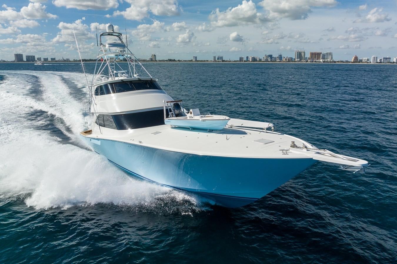 a white boat on the water aboard PANACEA Yacht for Sale