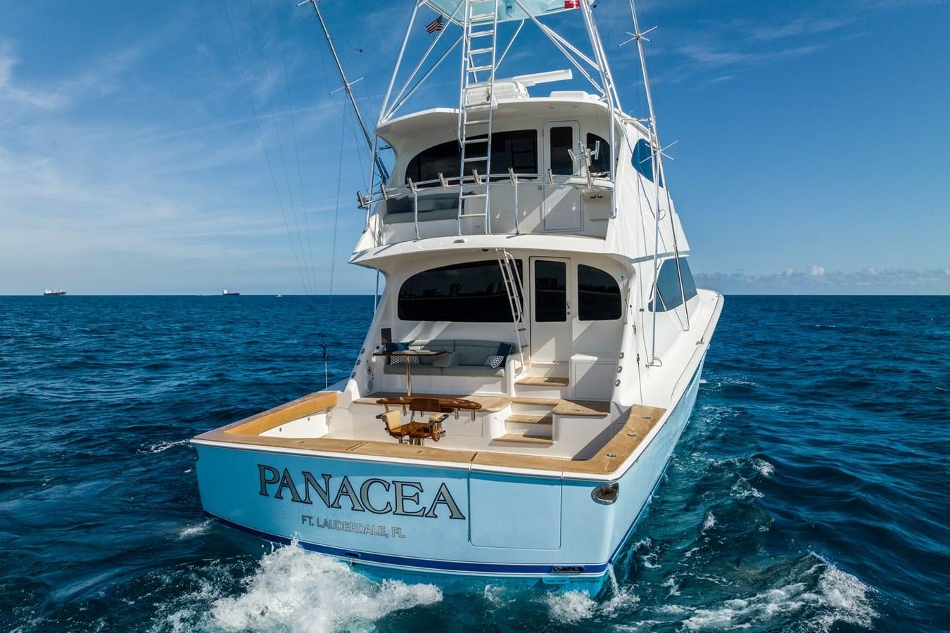 a white boat on the water aboard PANACEA Yacht for Sale