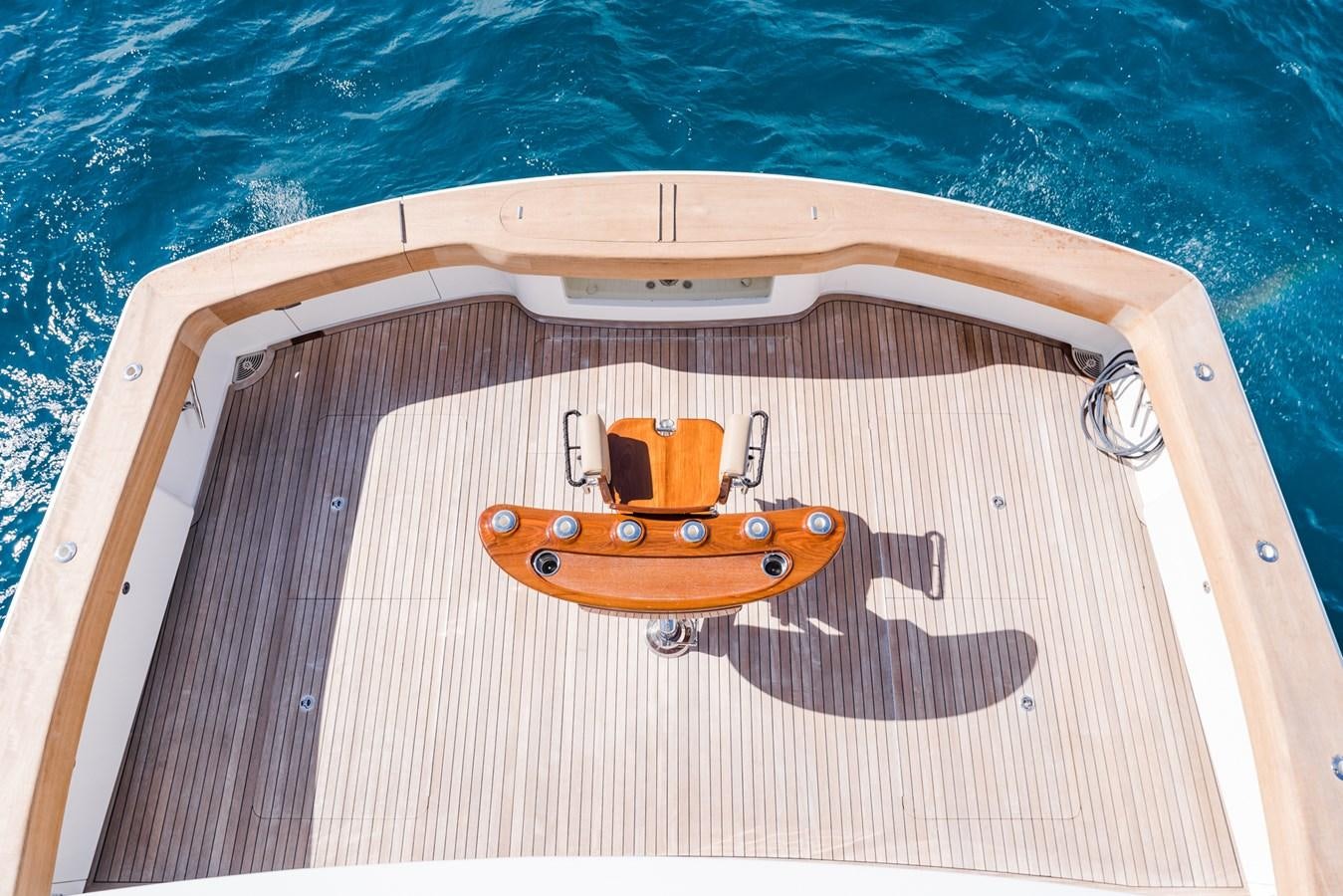 a wooden boat on a boat aboard PANACEA Yacht for Sale