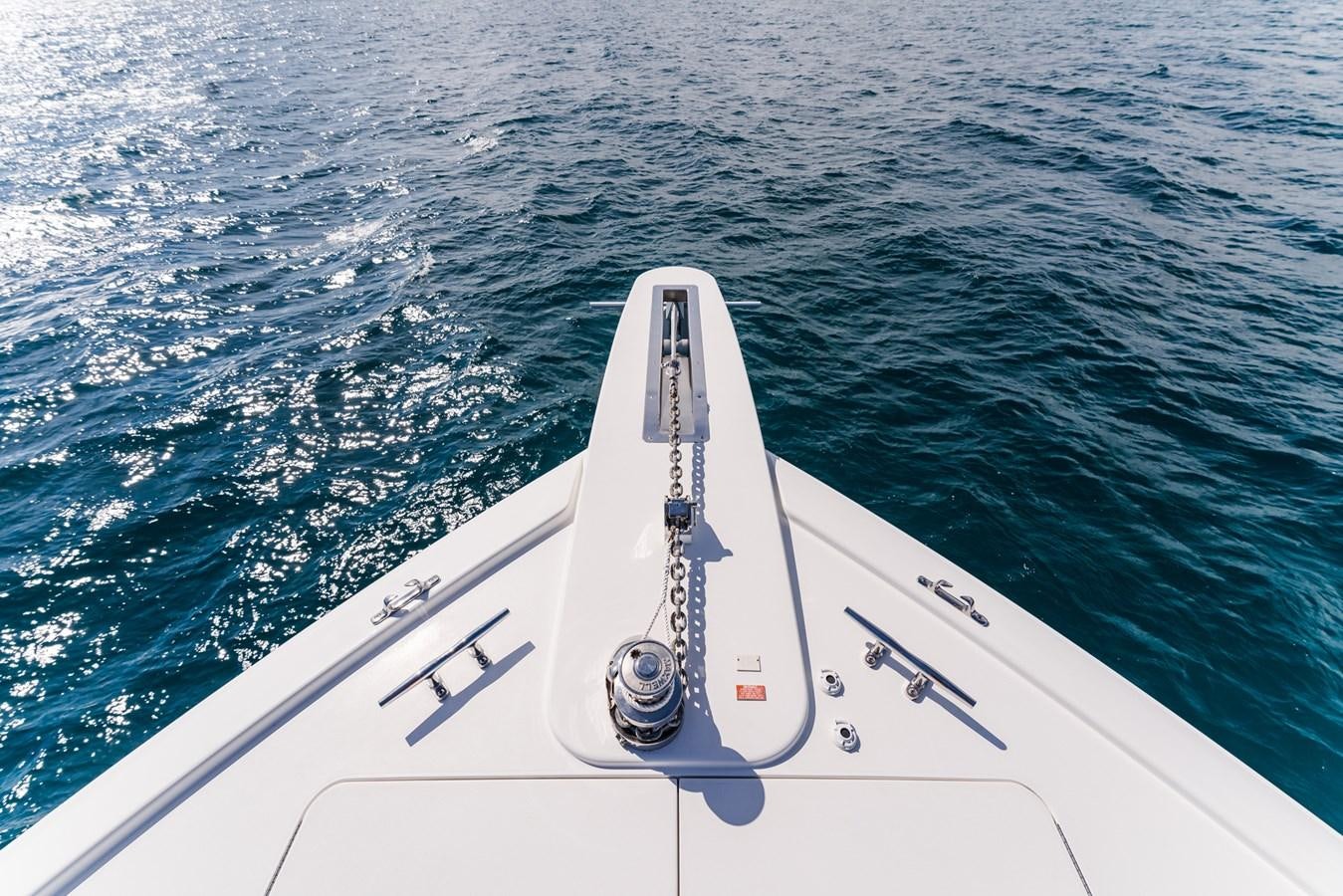 a white boat in the water aboard PANACEA Yacht for Sale