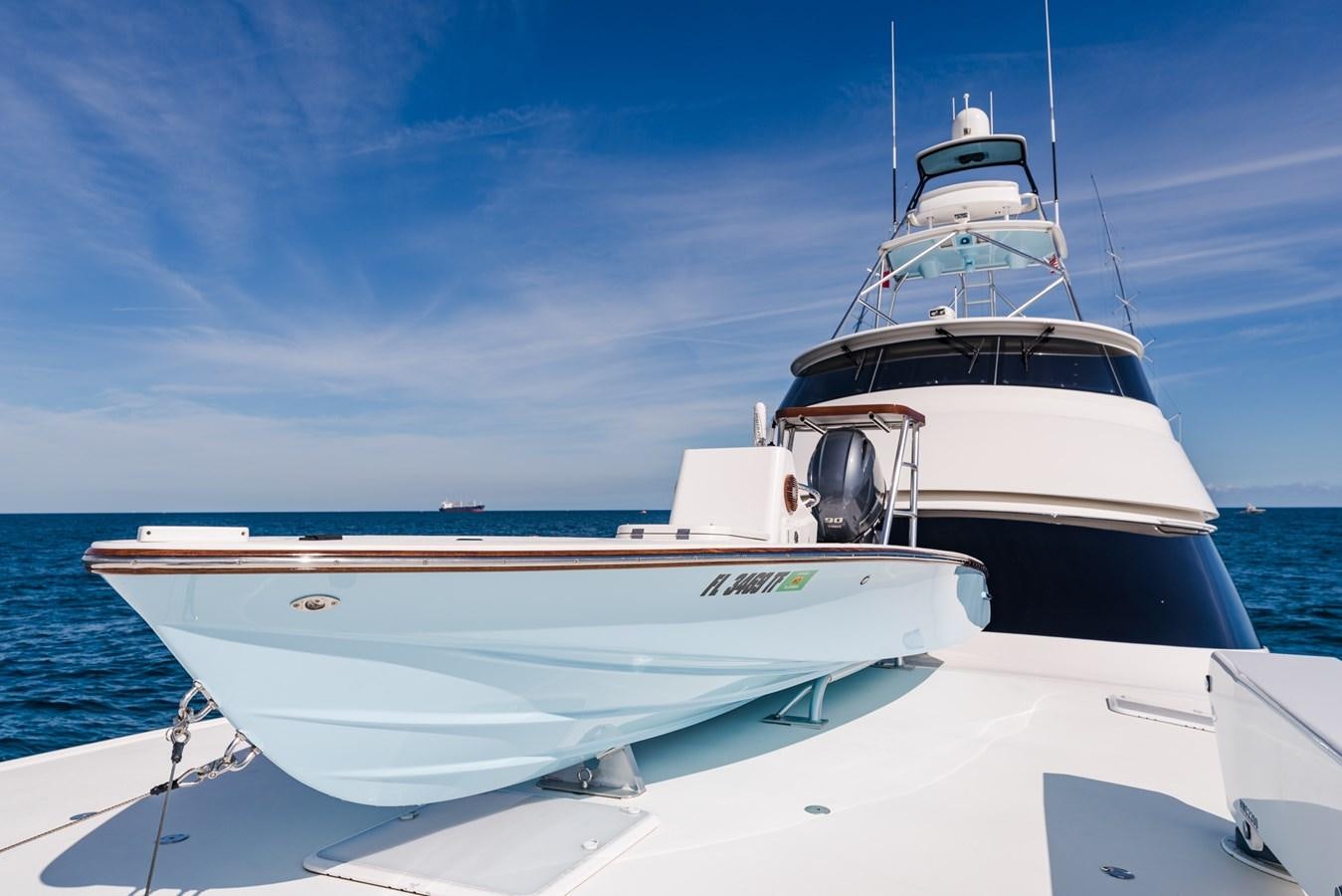 a white boat on the water aboard PANACEA Yacht for Sale