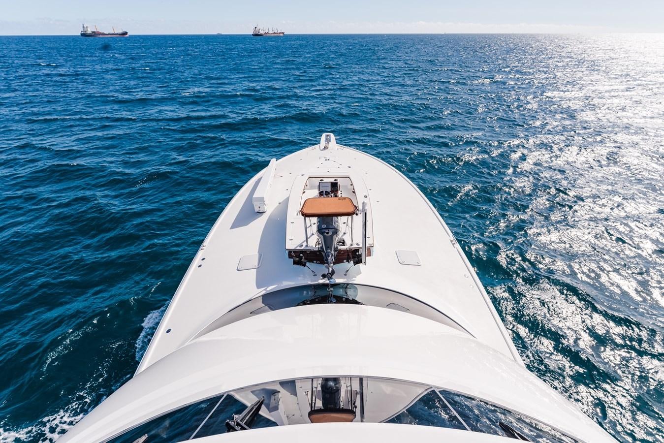 a white boat in the water aboard PANACEA Yacht for Sale