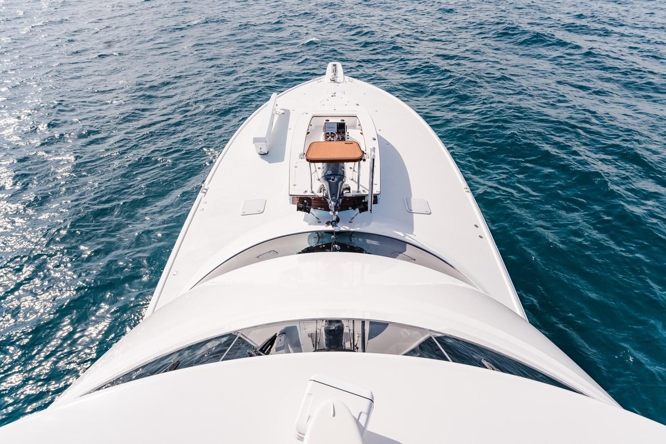a white yacht on the water aboard PANACEA Yacht for Sale