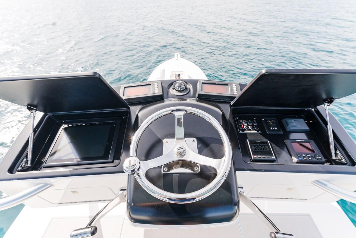 the inside of a car aboard PANACEA Yacht for Sale
