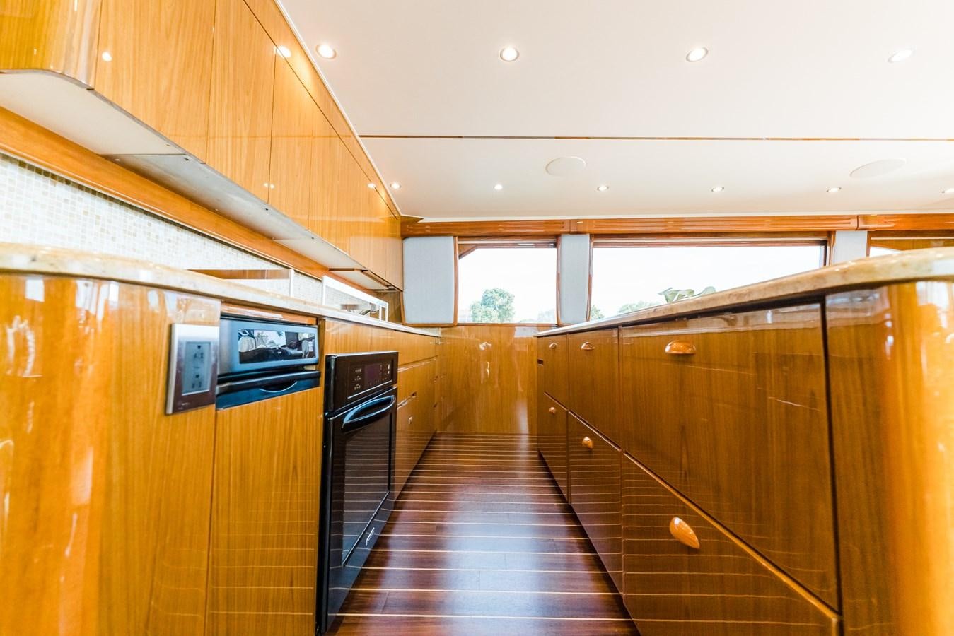 a wooden room with wooden cabinets aboard PANACEA Yacht for Sale
