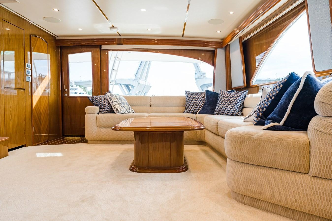 a living room with a couch and a table aboard PANACEA Yacht for Sale