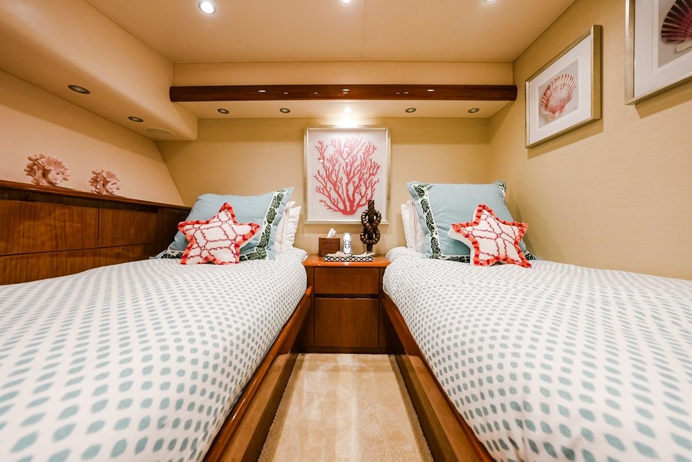 a couple of beds in a hotel room aboard PANACEA Yacht for Sale