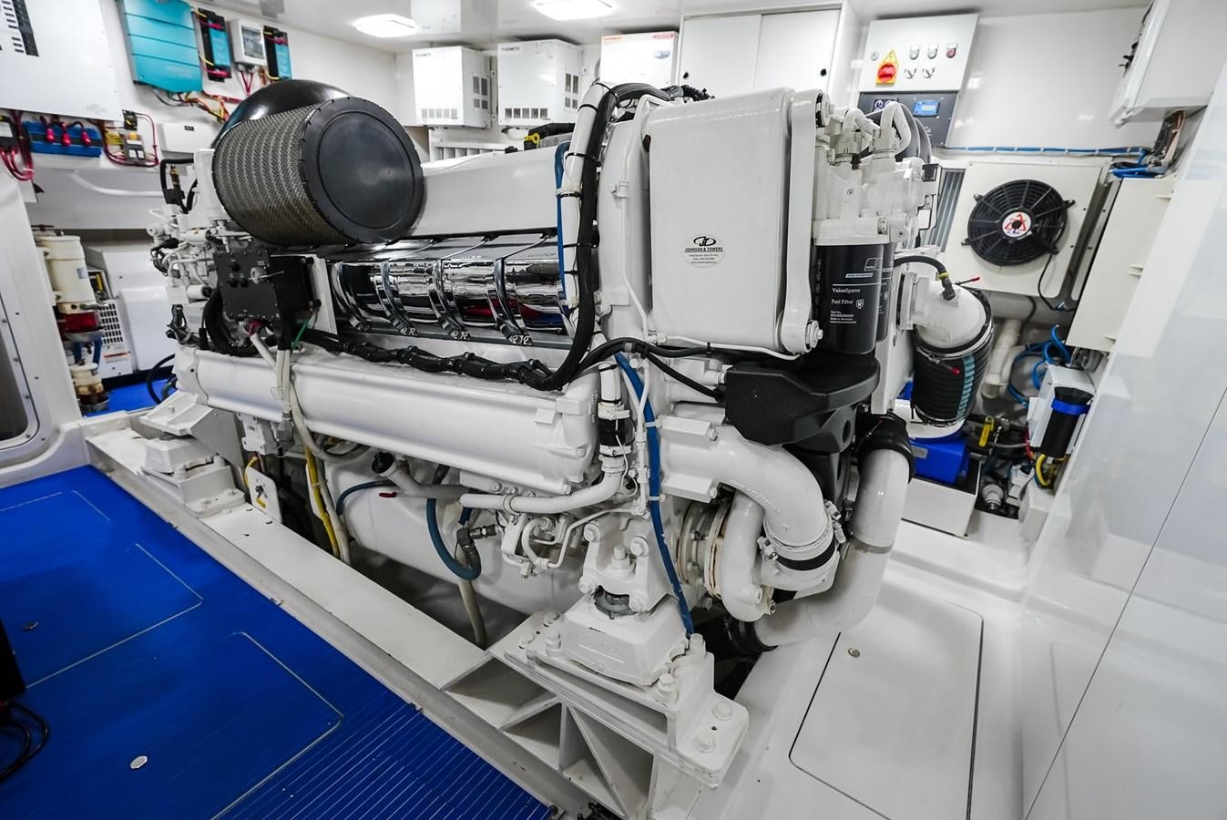 a room with a blue floor and white walls and a blue floor aboard PANACEA Yacht for Sale