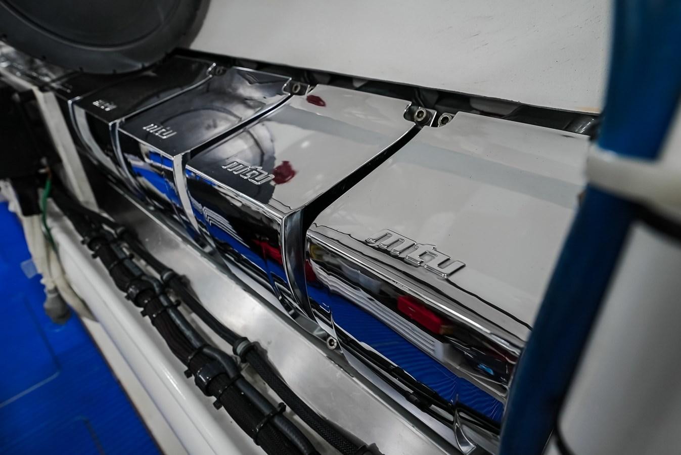 a close-up of a car engine aboard PANACEA Yacht for Sale