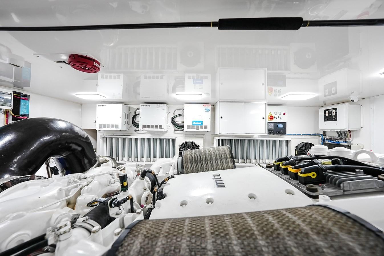 a room with a car and a bed aboard PANACEA Yacht for Sale