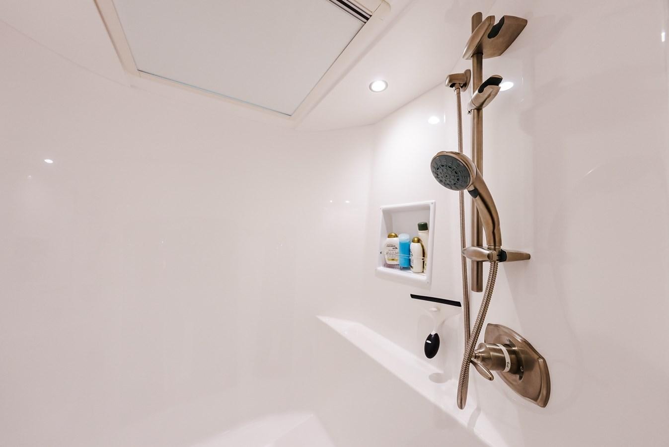a bathroom with a sink and a faucet aboard PANACEA Yacht for Sale