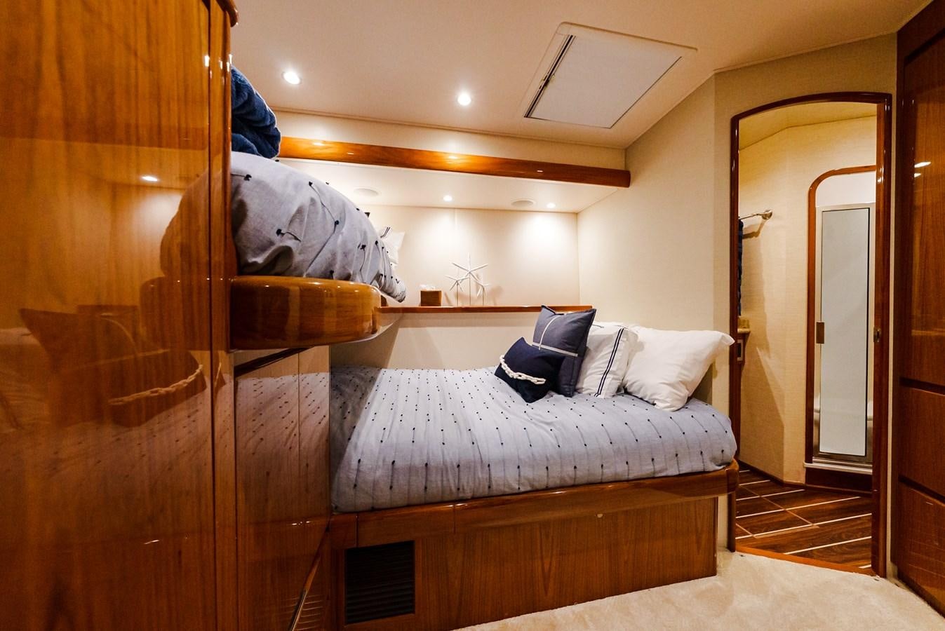 a bed in a room aboard PANACEA Yacht for Sale