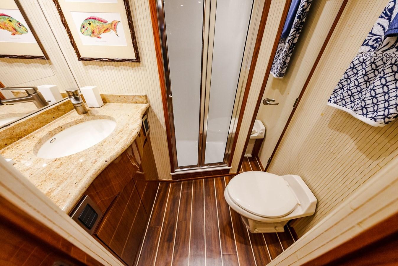 a bathroom with a sink and a toilet aboard PANACEA Yacht for Sale