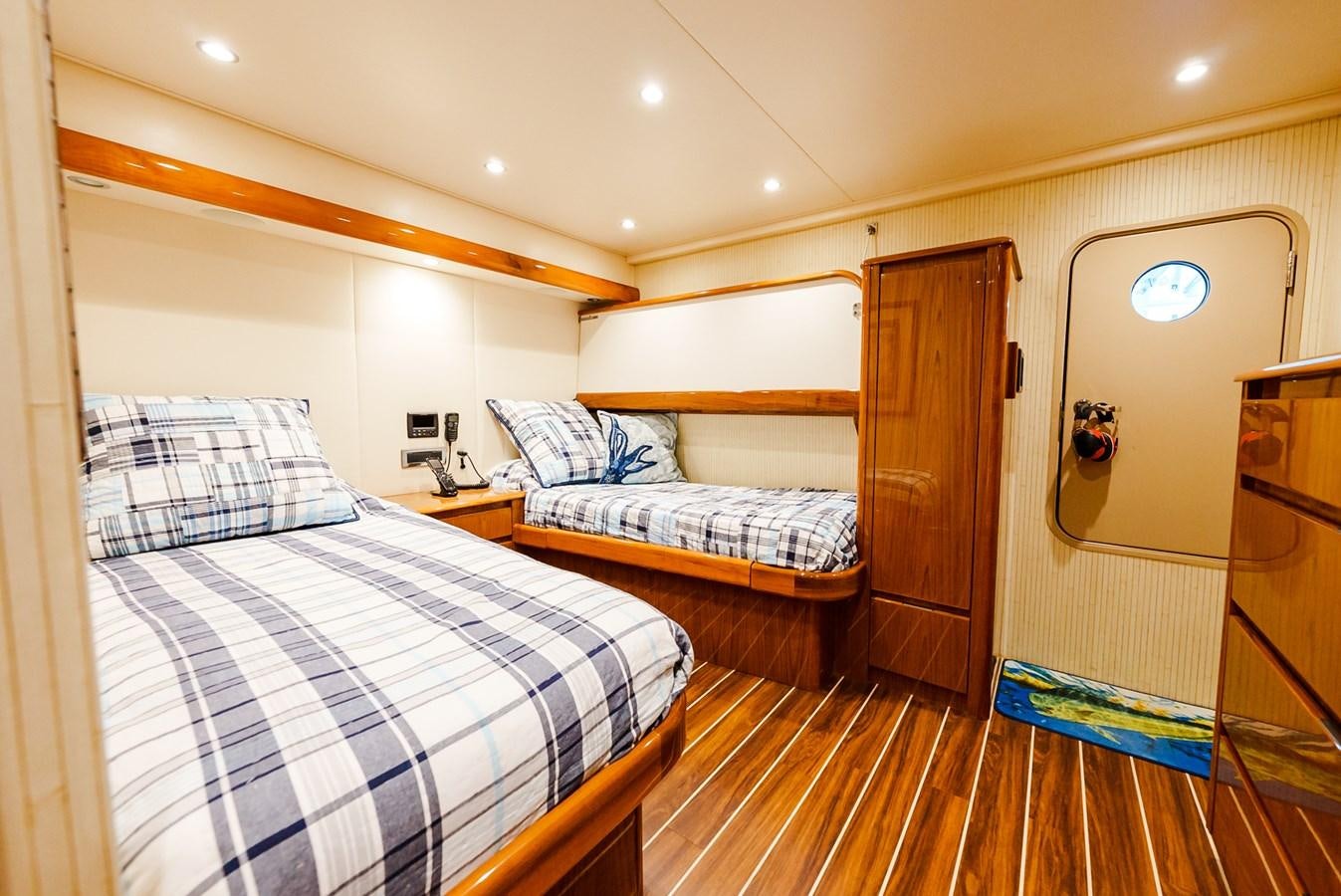 a bedroom with two beds aboard PANACEA Yacht for Sale