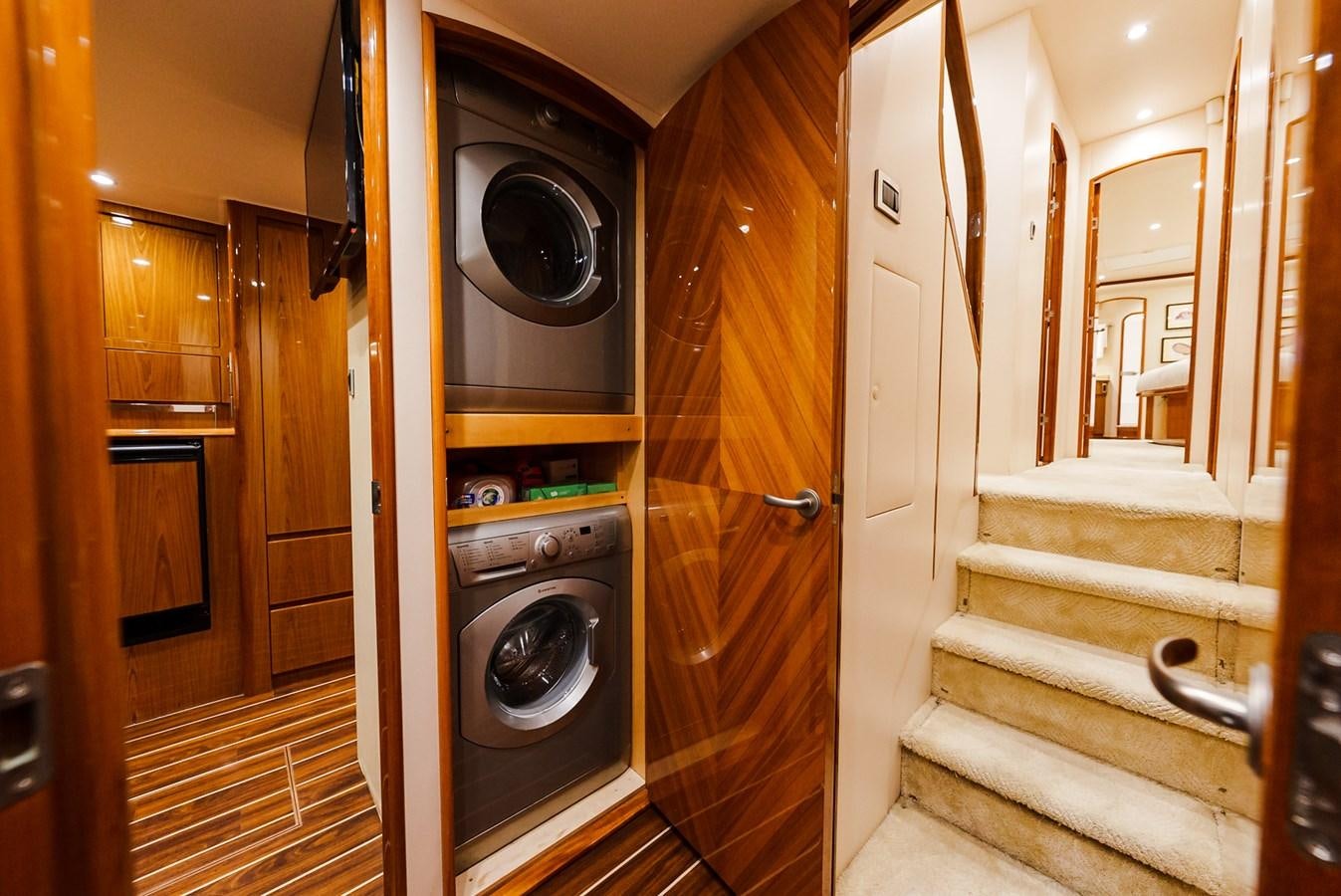 a room with a washer and dryer aboard PANACEA Yacht for Sale
