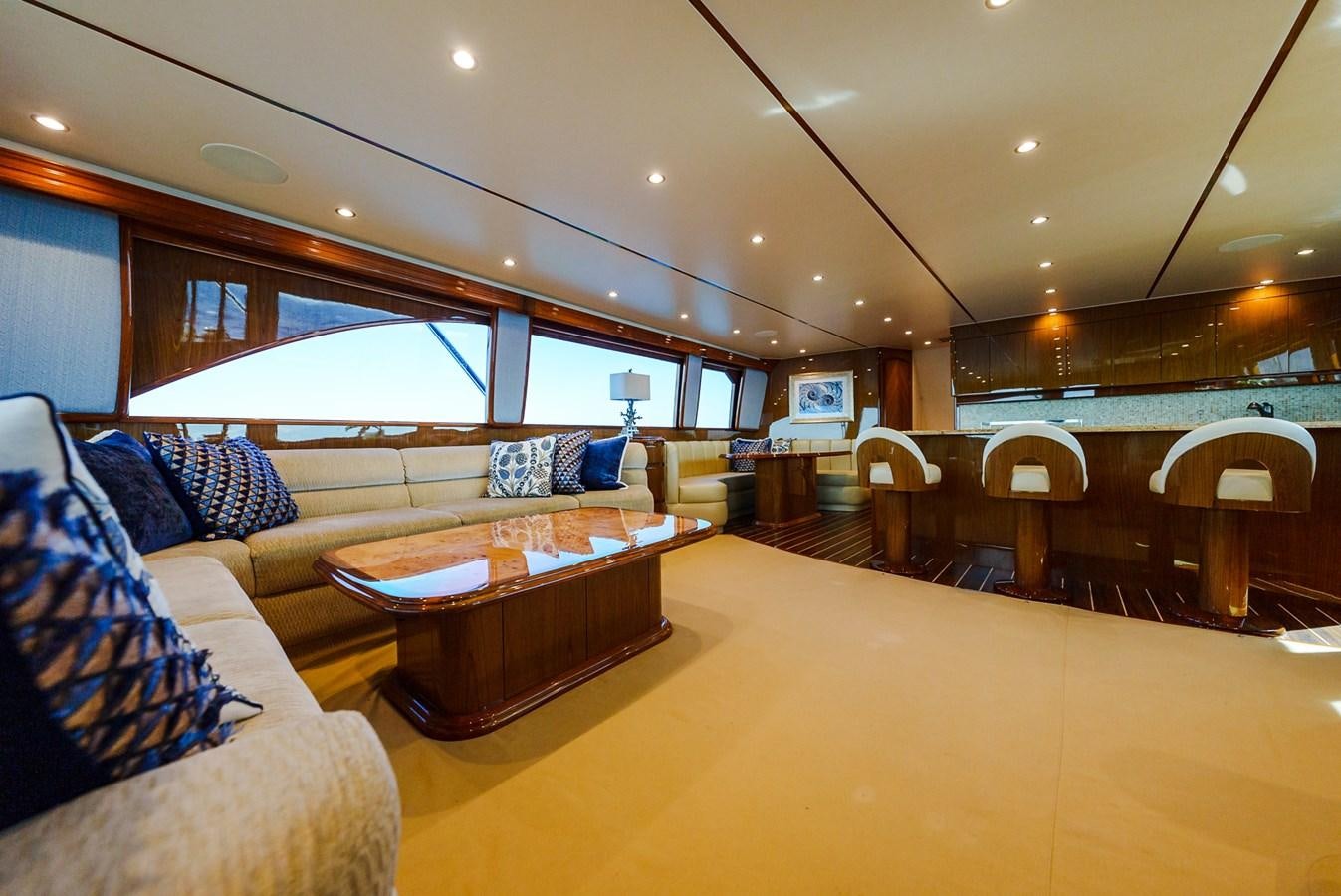a large living room with a large window aboard PANACEA Yacht for Sale