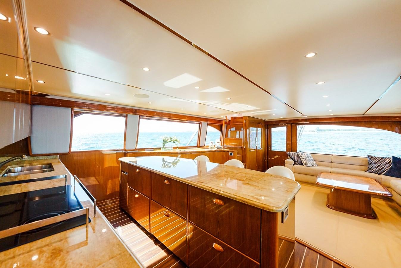 a kitchen with a large window aboard PANACEA Yacht for Sale