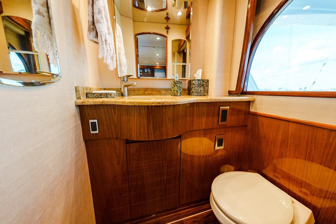 a bathroom with a sink and a toilet aboard PANACEA Yacht for Sale
