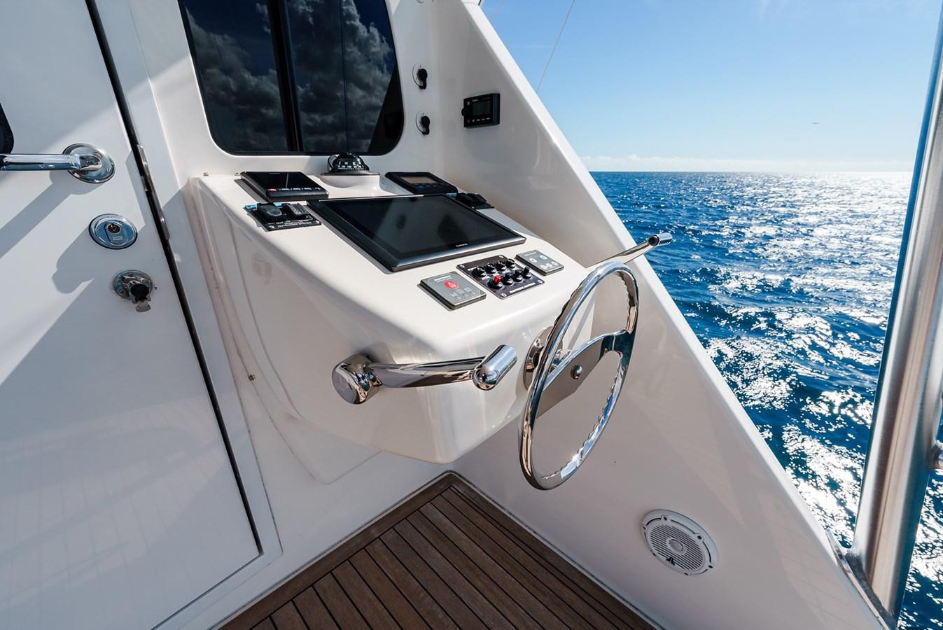 a boat with a steering wheel aboard PANACEA Yacht for Sale