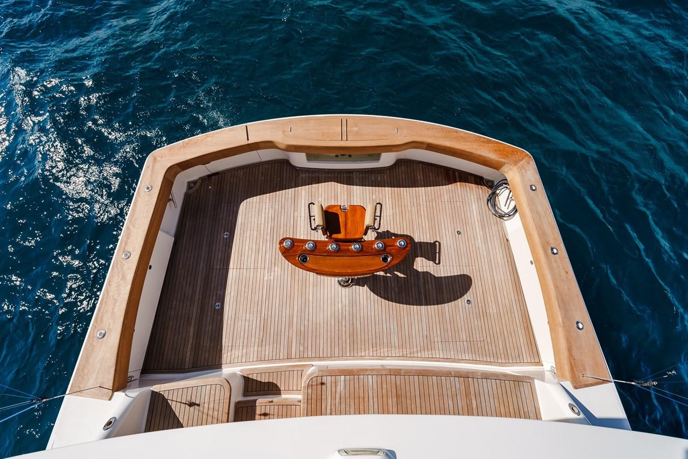 a wooden boat on a boat aboard PANACEA Yacht for Sale