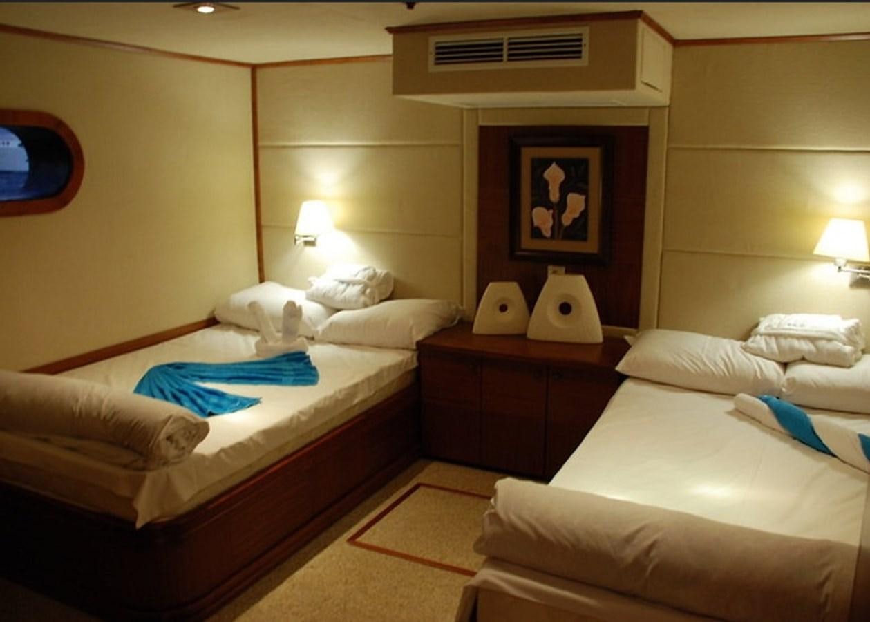 a room with two beds aboard 36 M YATCH Yacht for Sale