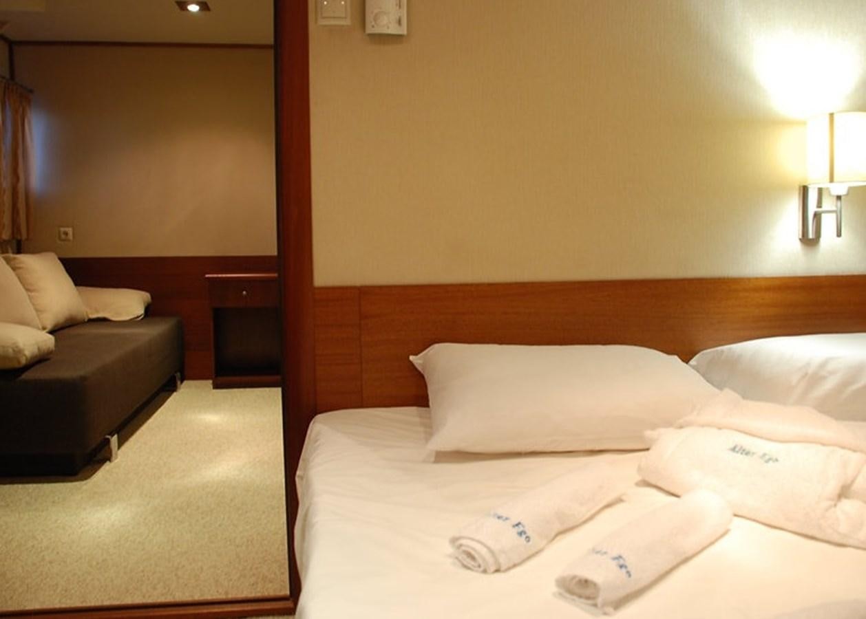 a hotel room with a bed and a couch aboard 36 M YATCH Yacht for Sale