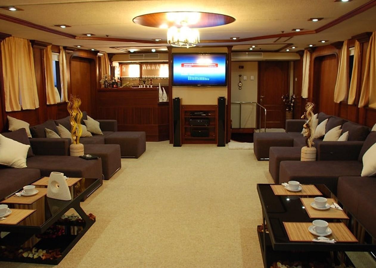 a living room with a fireplace aboard 36 M YATCH Yacht for Sale