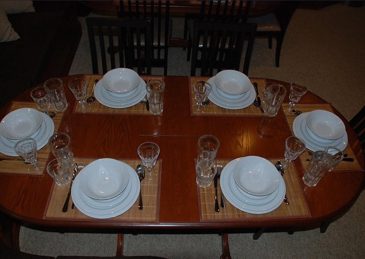 a table with plates and glasses on it aboard 36 M YATCH Yacht for Sale